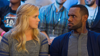 Illustration for article titled Amy Schumer's Trainwreck Can't Help Falling In Love With Itself